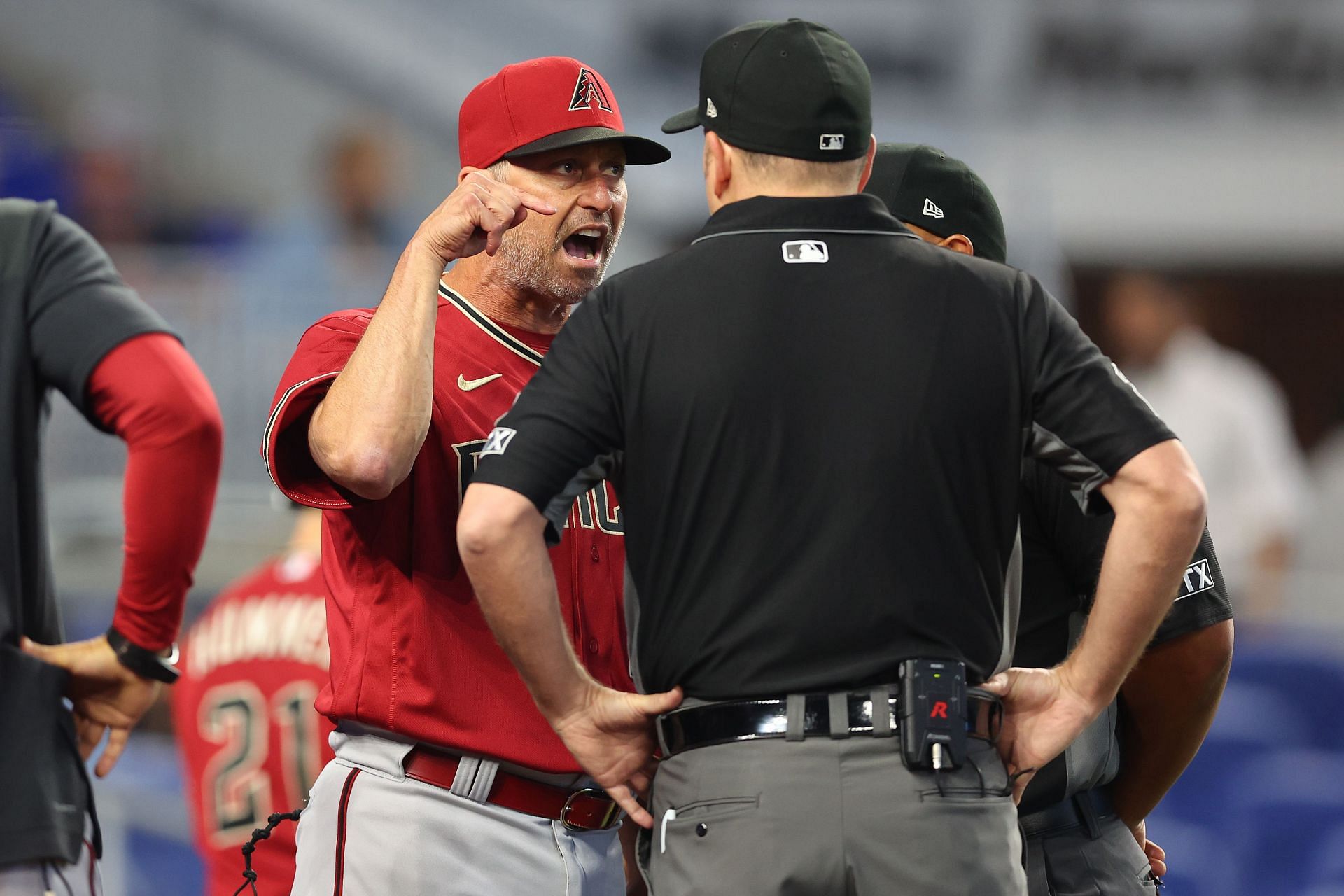 Diamondbacks manager Torey Lovullo argues with umpires after the ejection of Bumgarner in the first inning. Arizona Diamondbacks v Miami Marlins