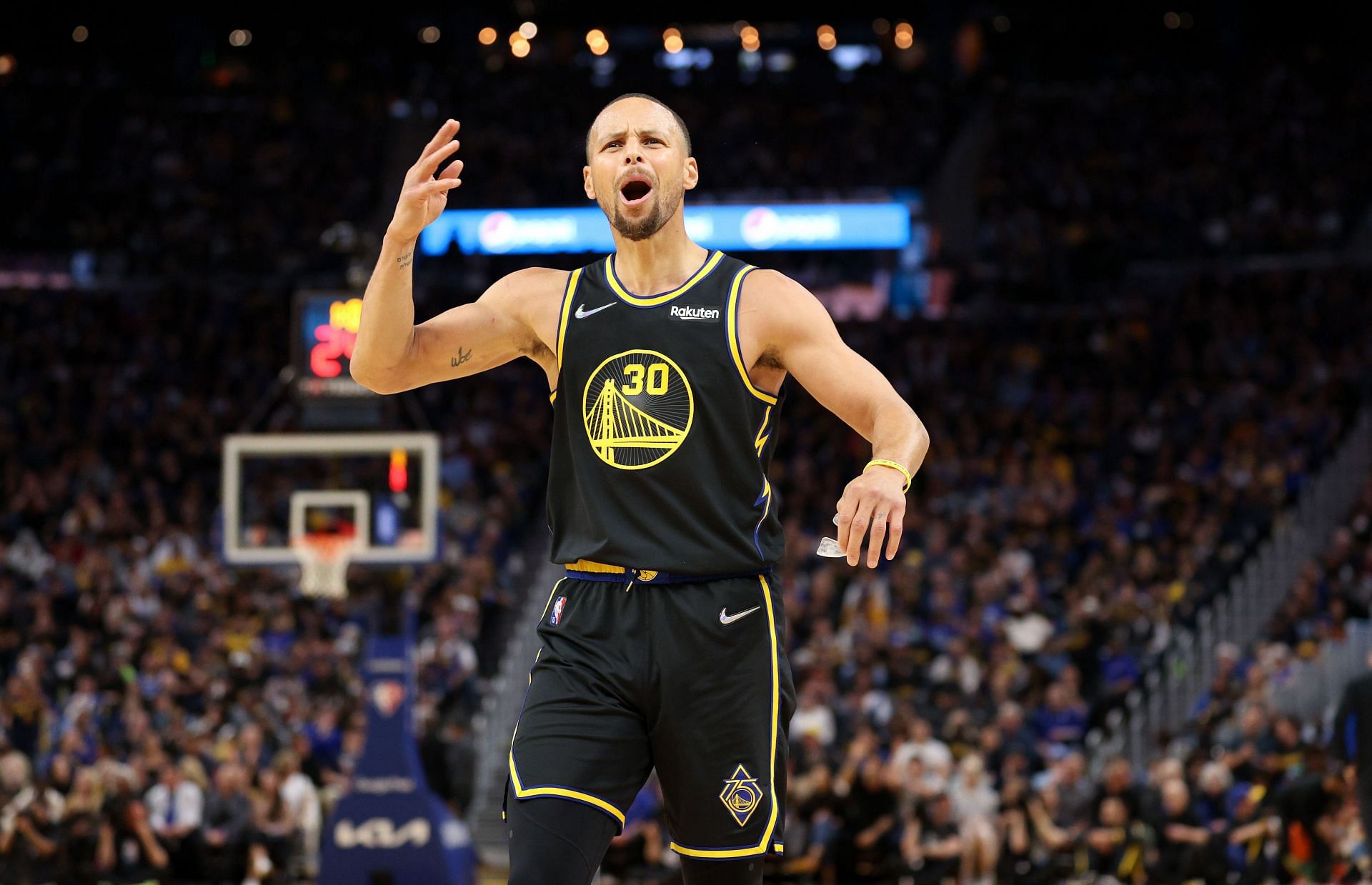 Steph Curry No. 30 of the Golden State Warriors gets the fired up against the Denver Nuggets.