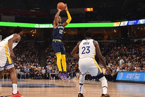 Draymond Green of the Golden State Warriors guarding Ja Morant of the Memphis Grizzlies.