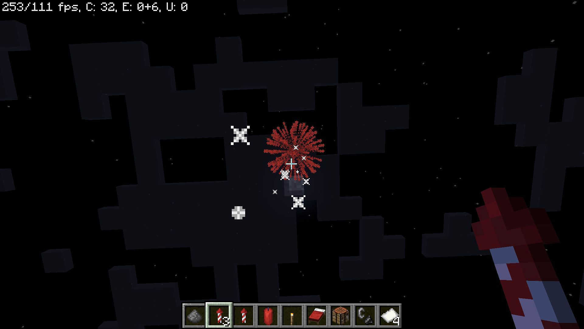 Red colored firework rocket exploding (Image via Minecraft)