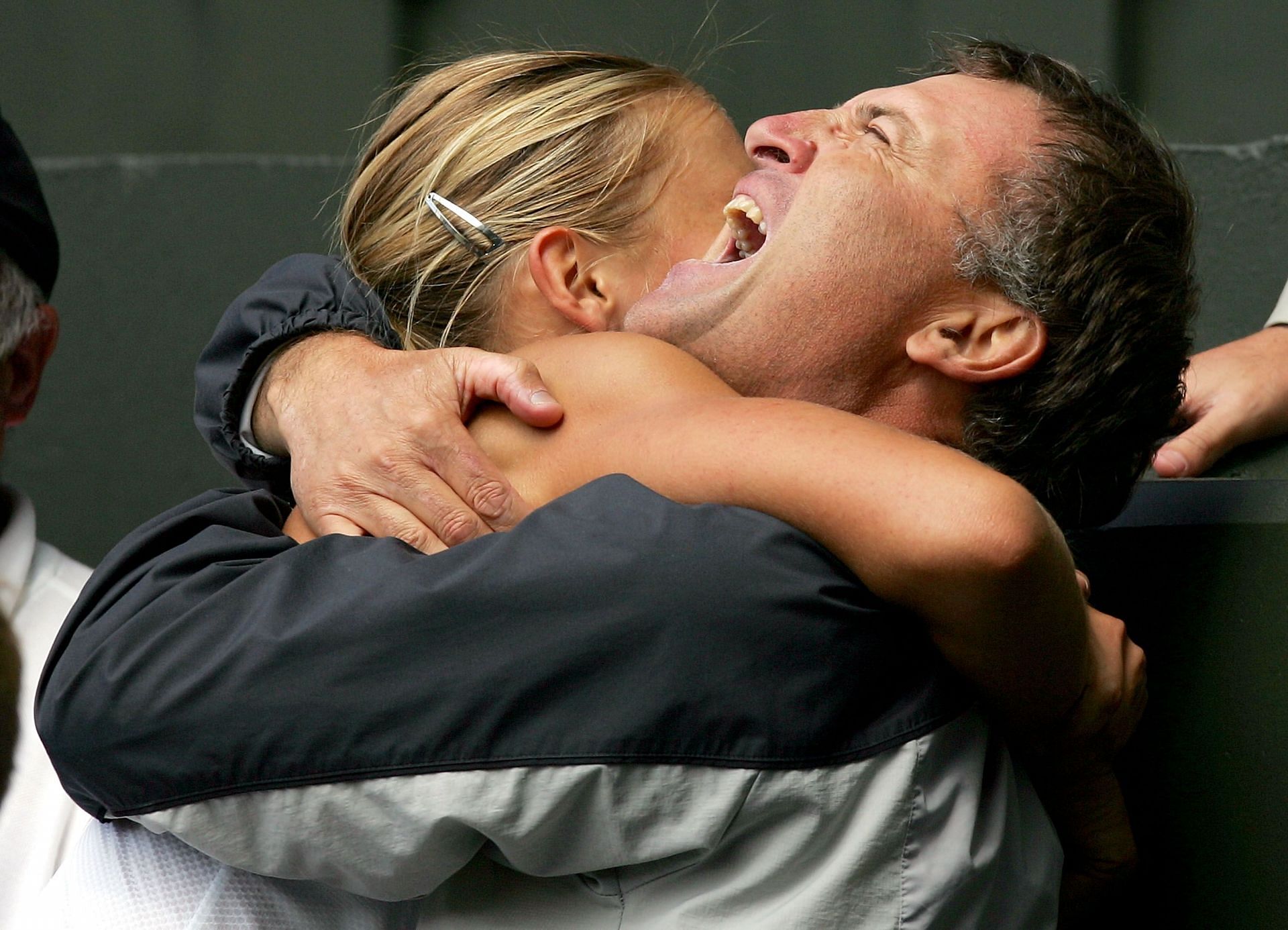 Maria Sharapova celebrating with her father after winning Wimbledon in 2004