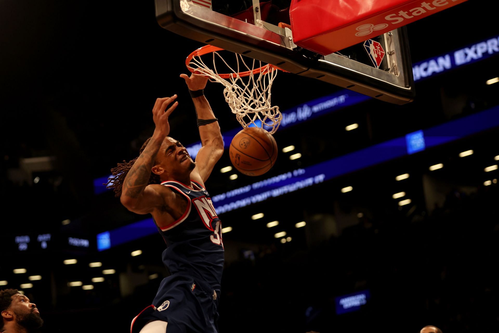 Nicolas Claxton scores off a dunk