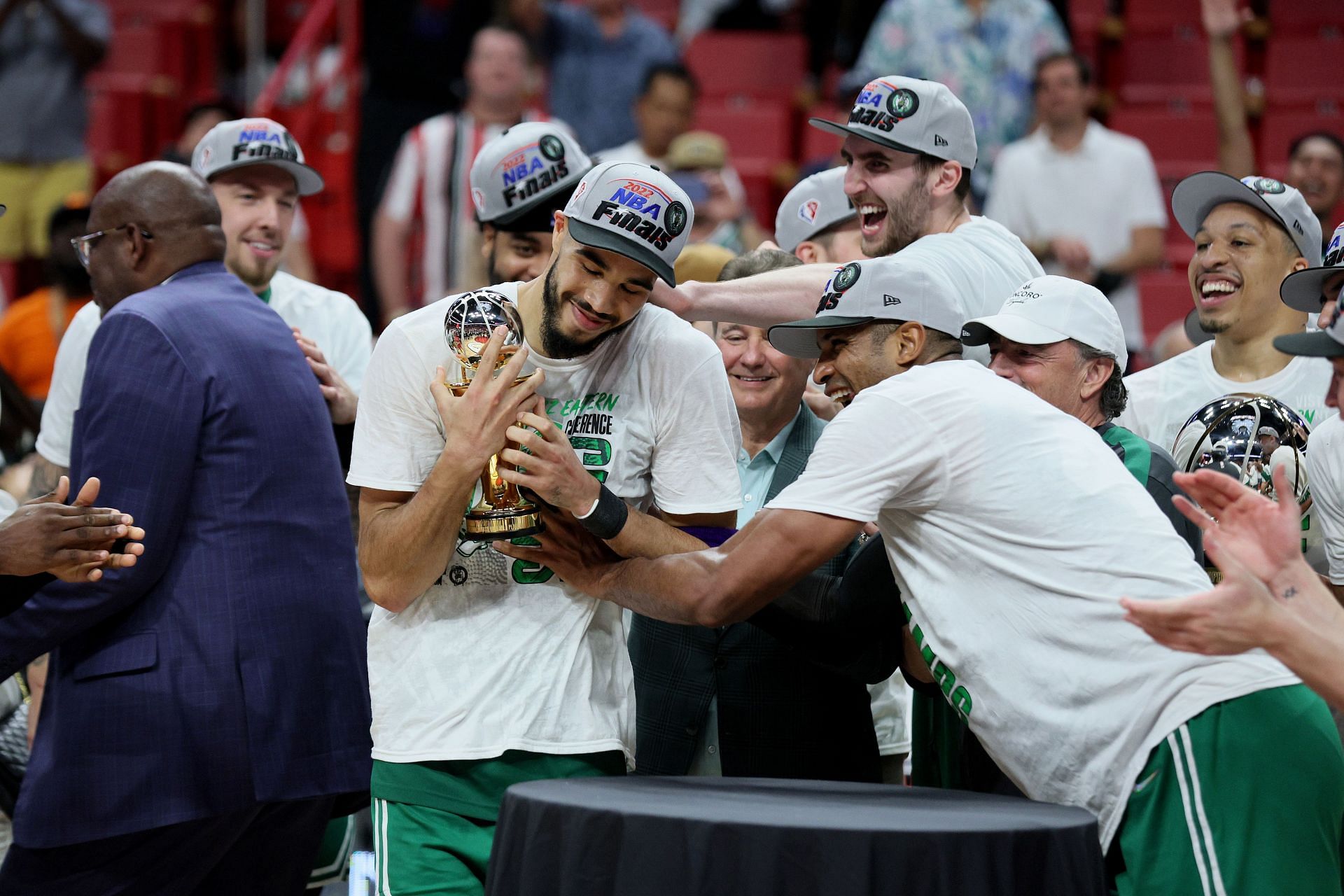 Tatum celebrates with his teammates after being awarded the Eastern Conference Larry Bird MVP trophy.