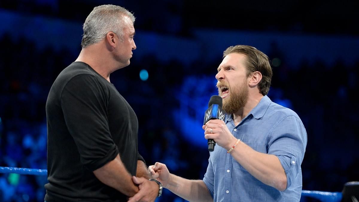 Daniel Bryan as SmackDown General Manager in the ring with Shane McMahon