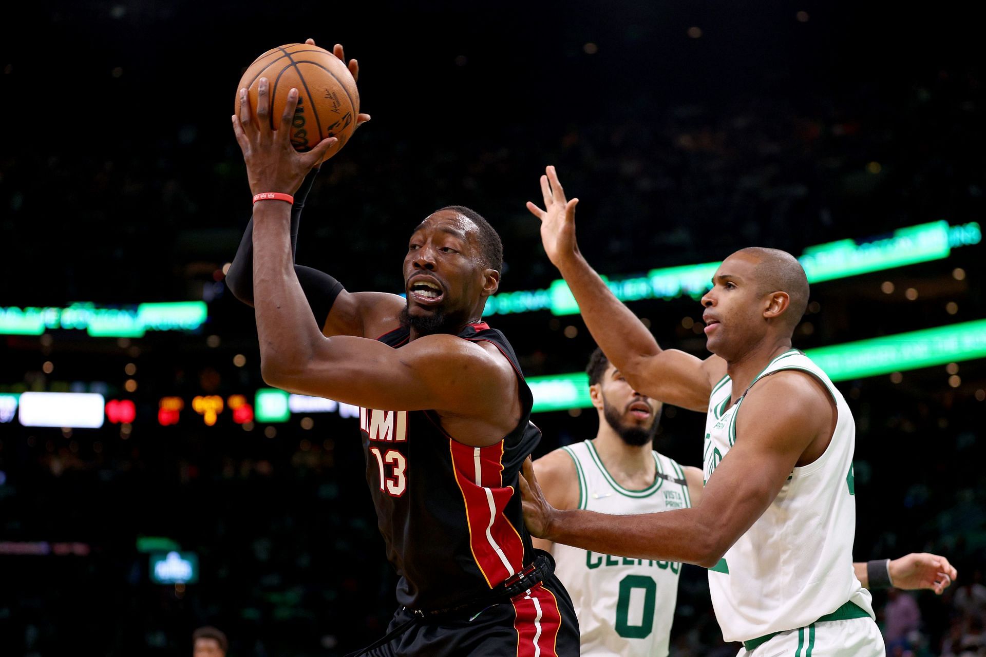 Bam Adebayo attempts to shoot the ball against Al Horford