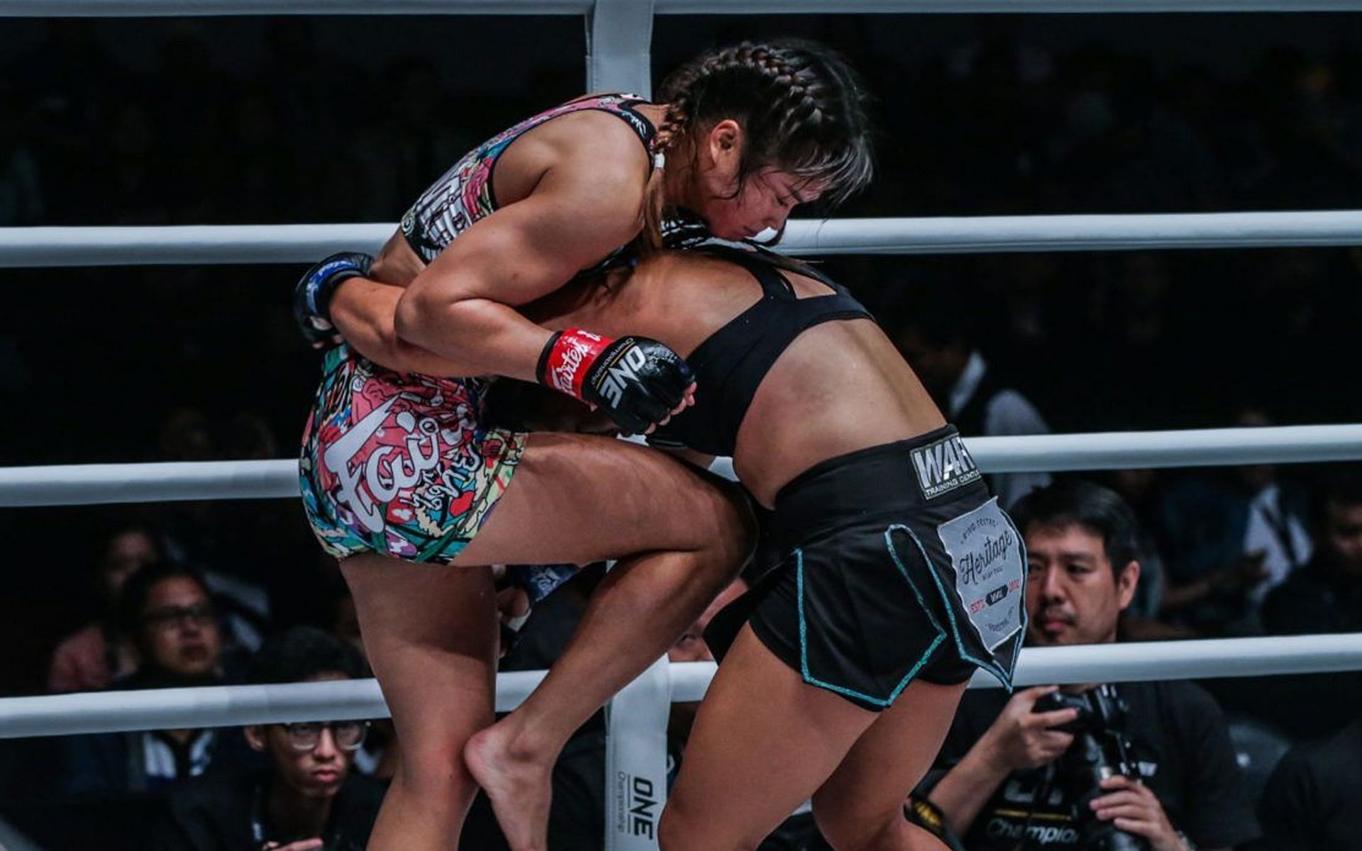 Stamp (L) expertly uses the clinch to unleash her devastating knees on her opponents. | [Photo: ONE Championship]