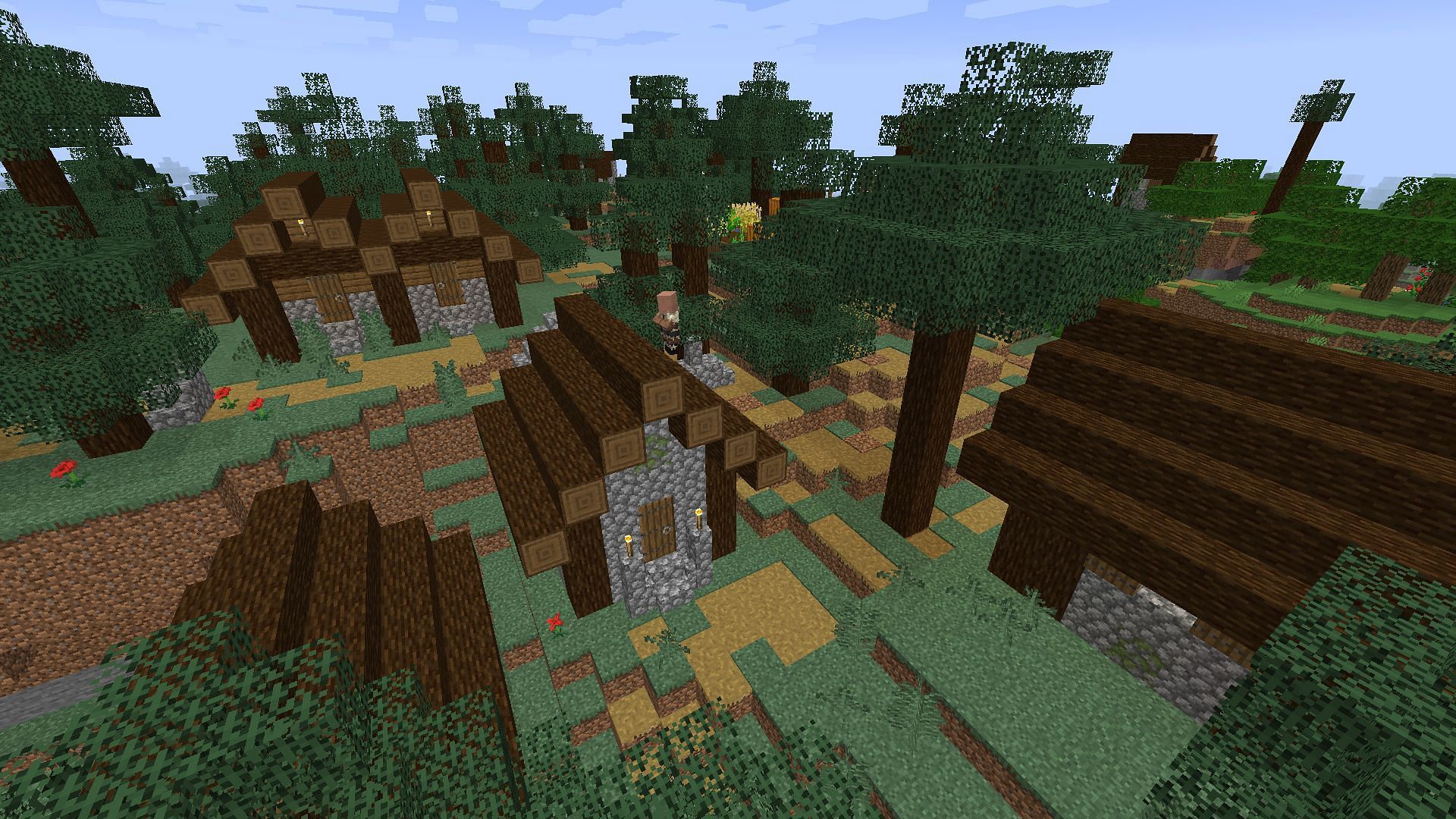 The example village with the default textures (Image via Minecraft)