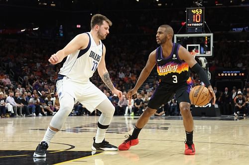 Luka Doncic and Chris Paul in action during Dallas Mavericks v Phoenix Suns - Game One