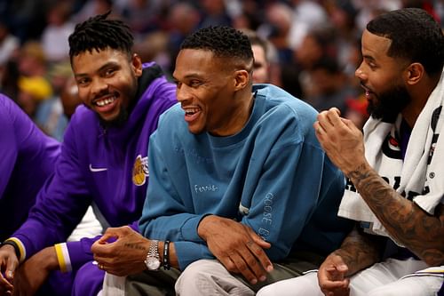 Russell Westbrook of the LA Lakers laughs on the bench.