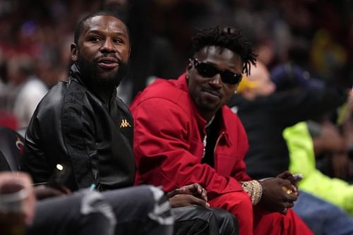 Former Tampa Bay Buccaneers wide receiver Antonio Brown and boxer Floyd Mayweather Jr.