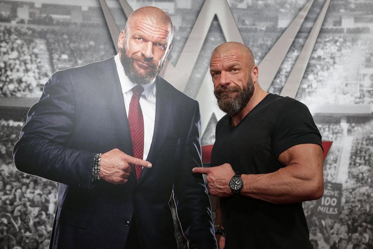 Triple H recreating his iconic pose with himself