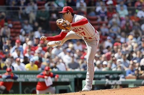 Shohei Ohtani follows through on a pitch against the Boston Red Sox.