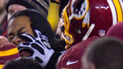 Richard Sherman is being punched by Trent Williams. Source: NFL.com