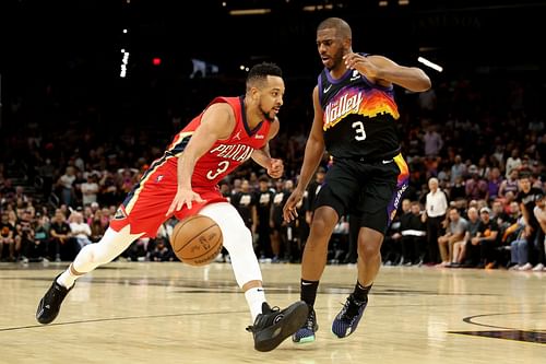 CJ McCollum (left) believes Patrick Beverley's (not in pic) attack on Chris Paul (right) was personal