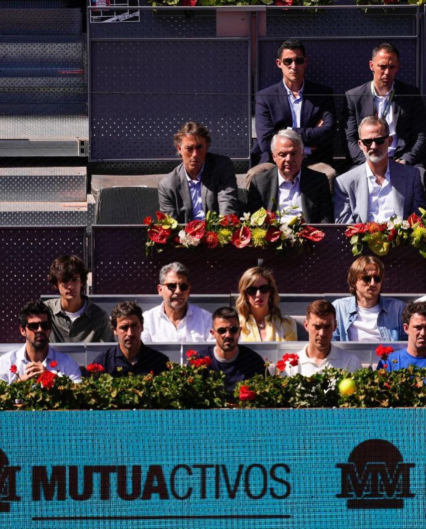 Raul, David Villa and Luka Modric sit pitchside to watch Rafael Nadal take on Alcaraz