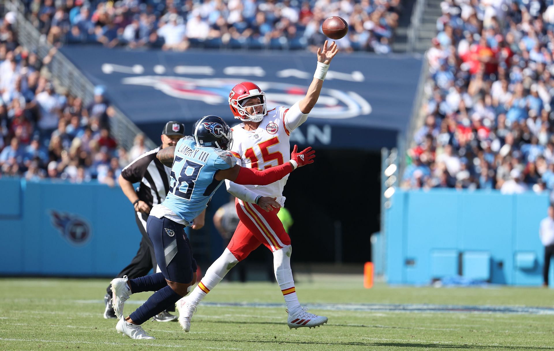 Mahomes narrowly escaped the sack against the Titans