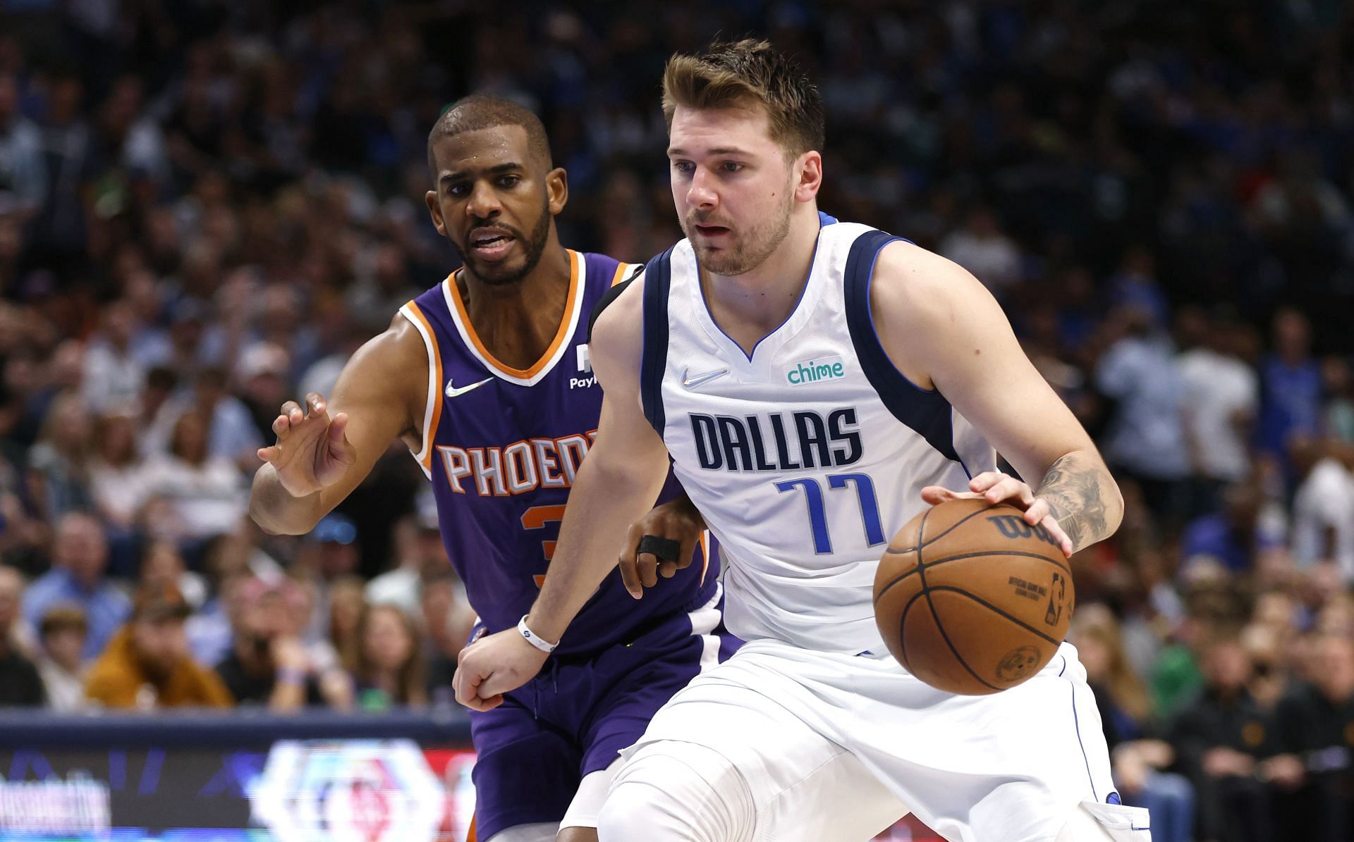 Chris Paul of the Phoenix Suns defends Luka Doncic of the Dallas Mavericks in the 2022 NBA Western Conference Semifinals