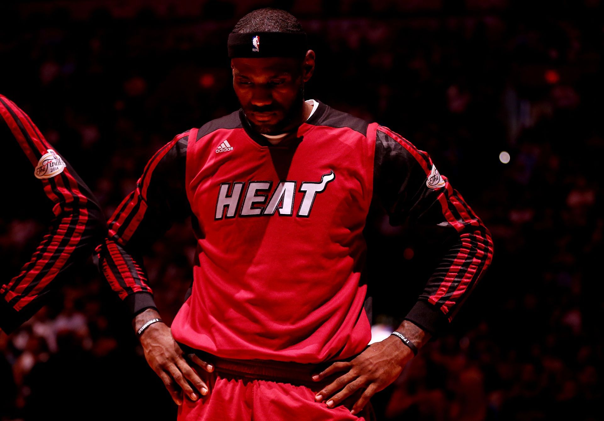 LeBron James #6 of the Miami Heat looks on during the national anthem prior to Game Five of the 2014 NBA Finals against the San Antonio Spurs at the AT&amp;T Center on June 15, 2014 in San Antonio, Texas.