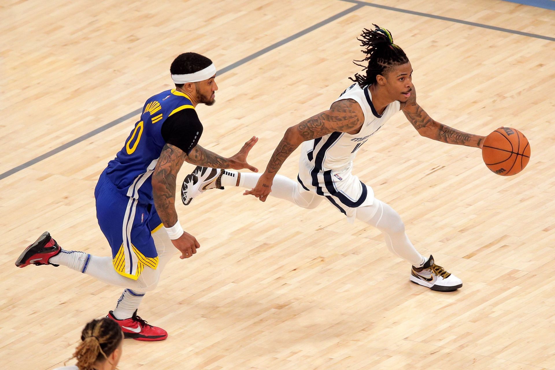 Ja Morant dribbles past Gary Payton II