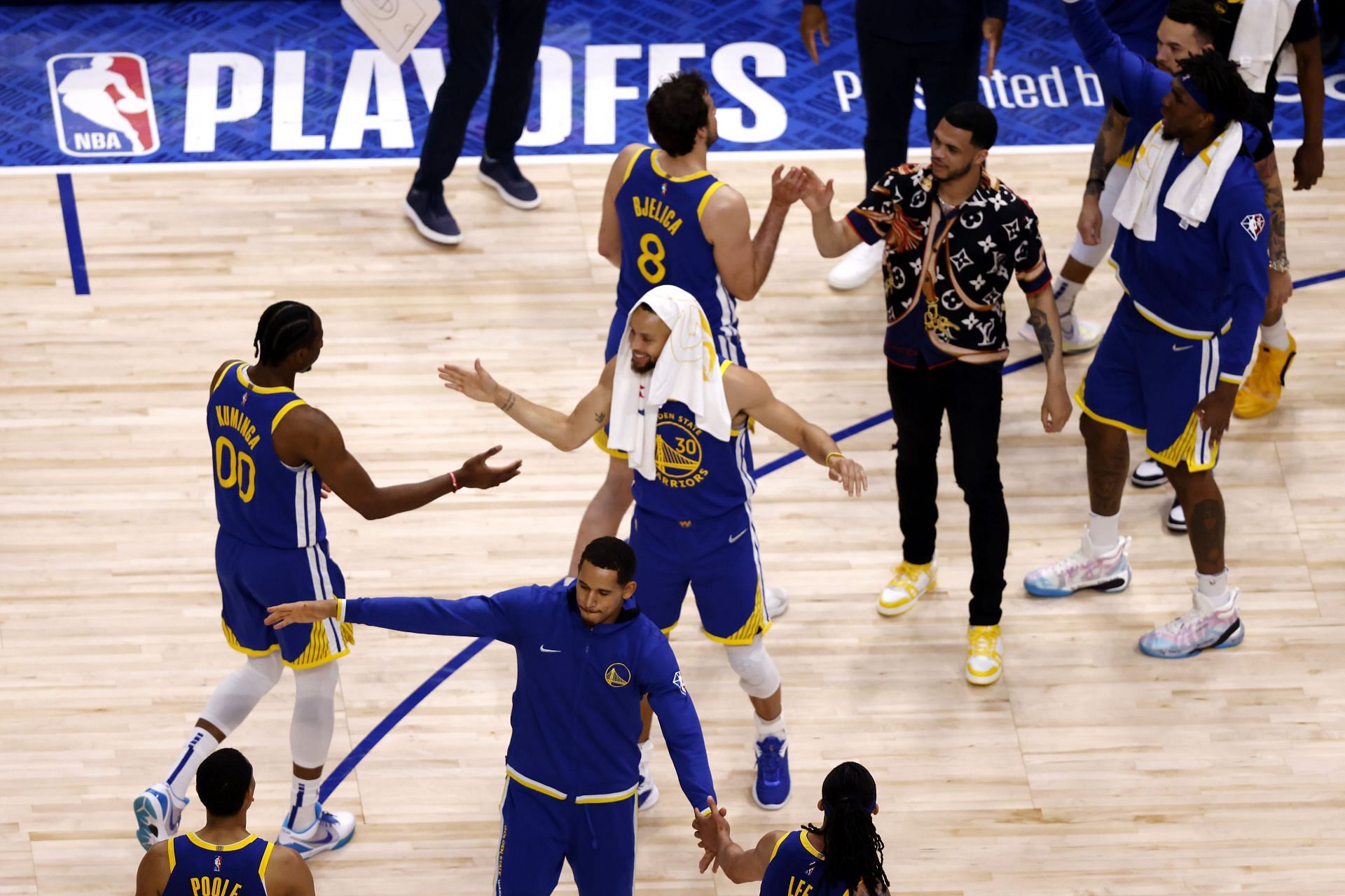 The Golden State Warriors react to a play as they head into a timeout