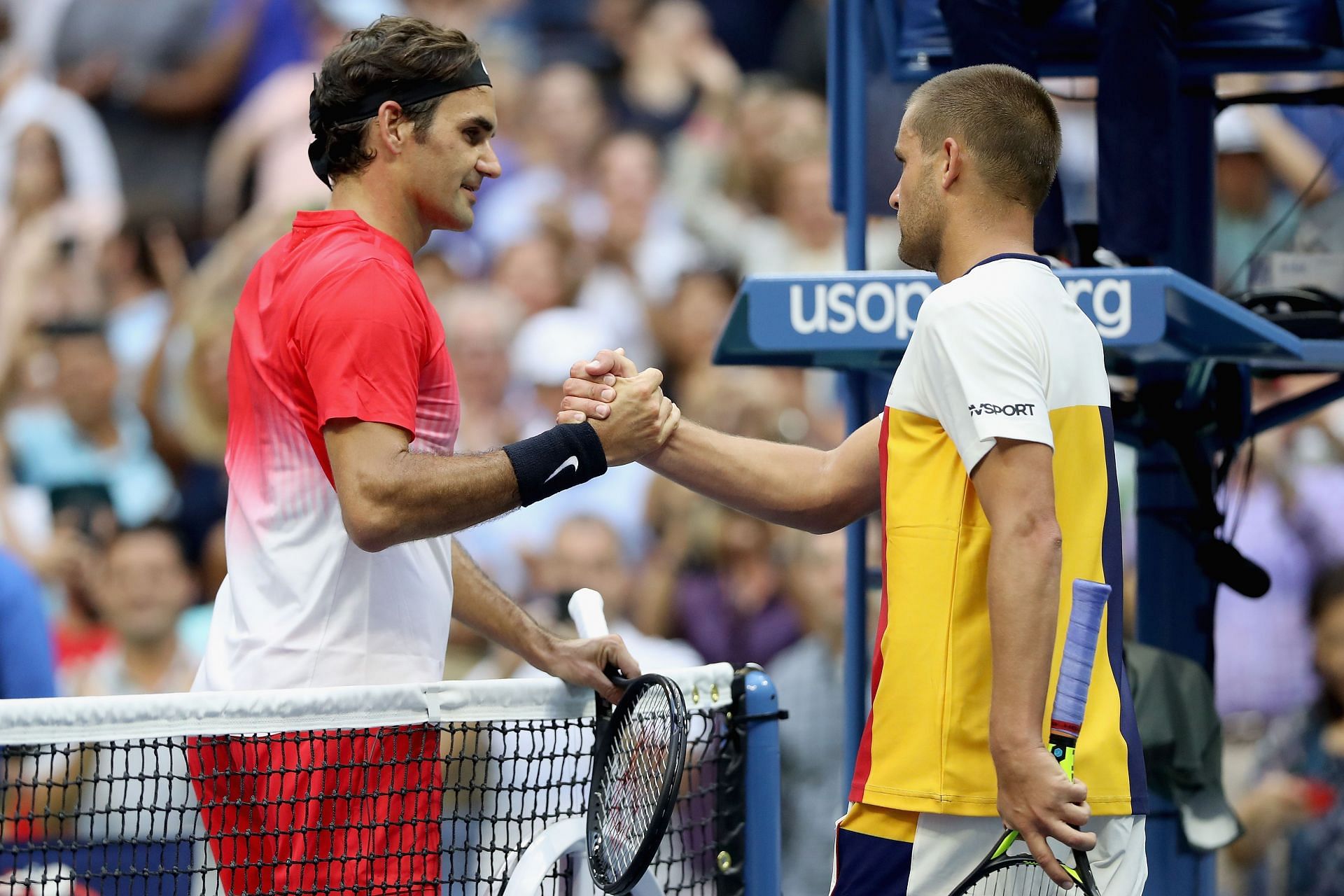 Roger Federer (left) beat Mikhail Youzhny for the 17th time at the 2017 US Open