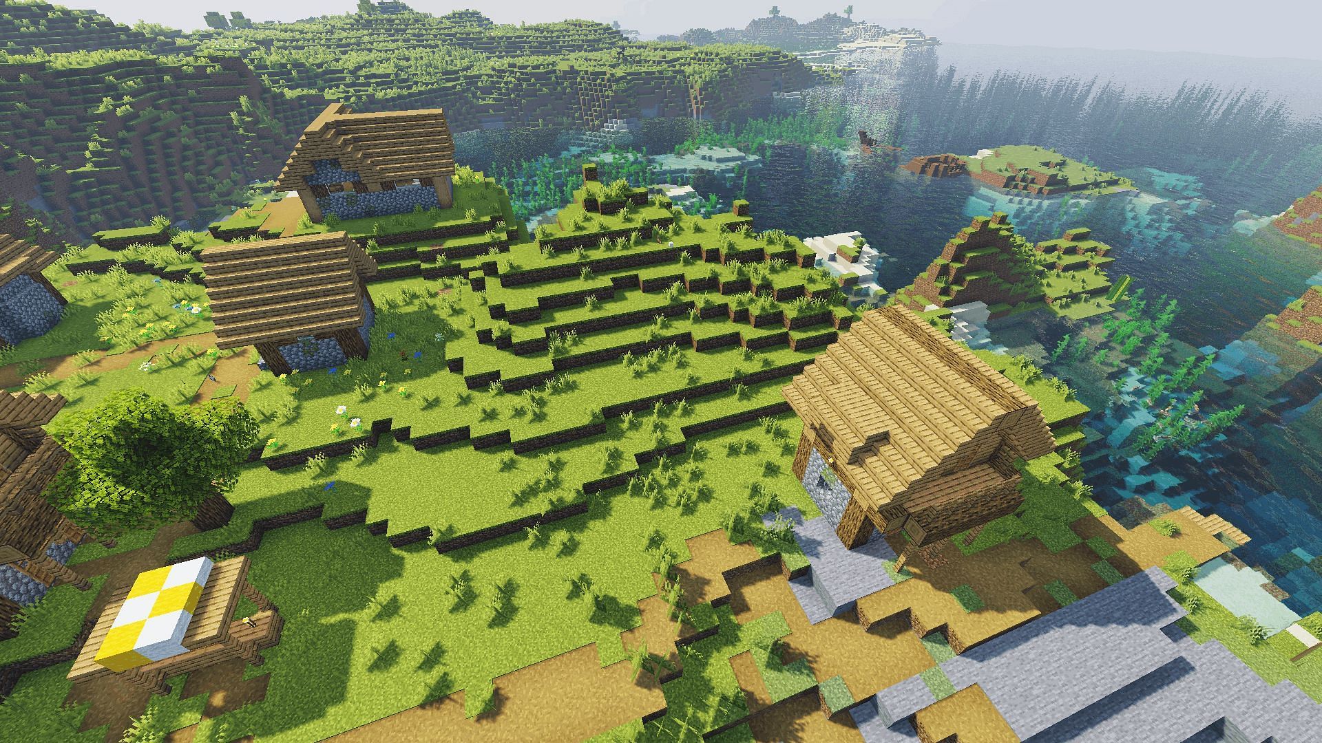 A coastal village with the ProjectLuma shader (Image via Minecraft)