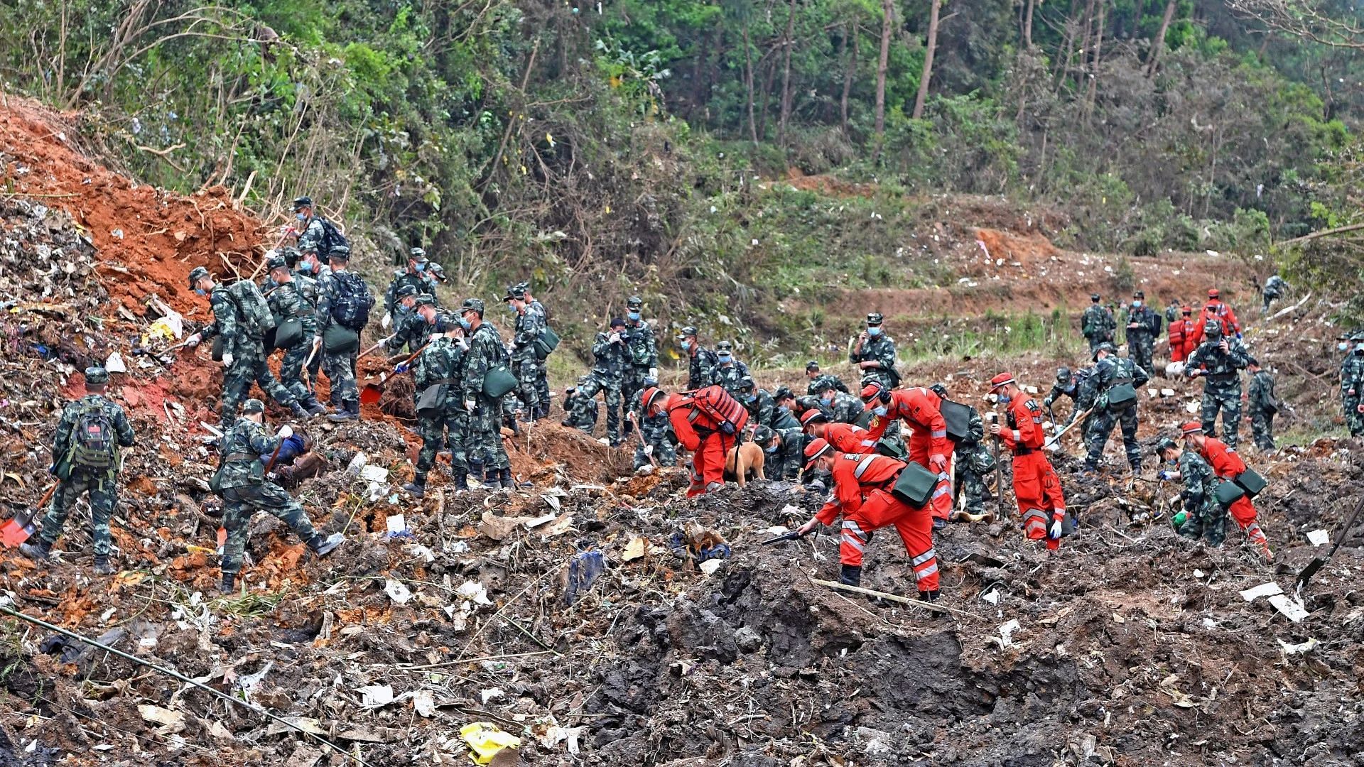 One black box was found in the China Eastern plane crash ( Image via Zhou Hua)