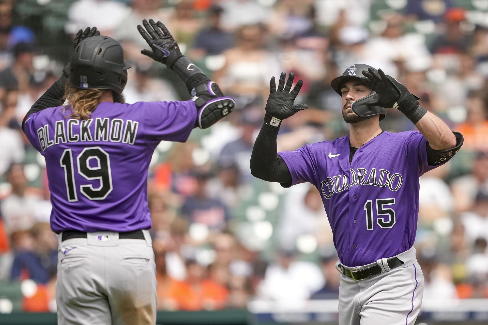 Randal Grichuk of the Colorado Rockies celebrates hitting a home run with Charlie Blackmon.