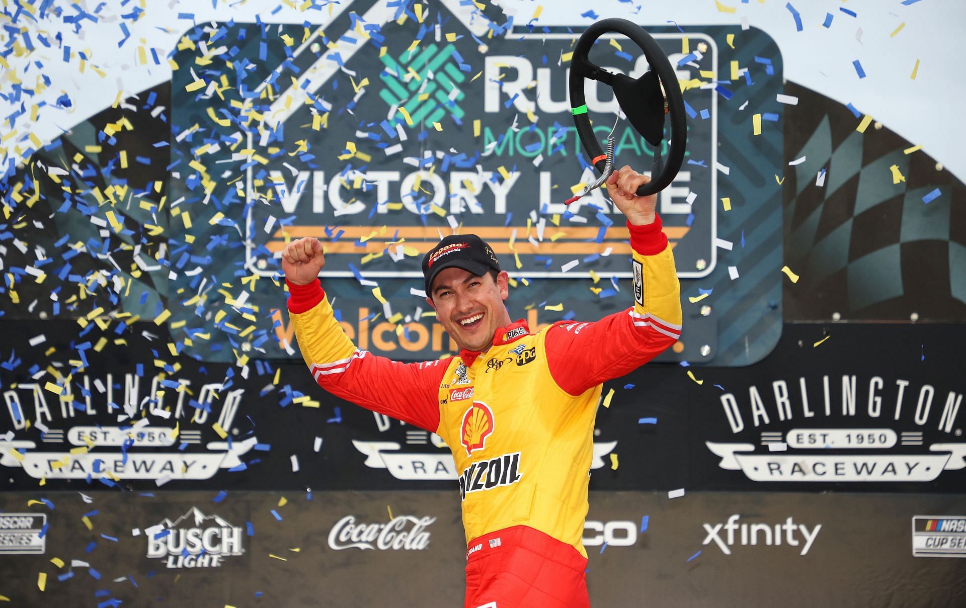 Joey Logano celebrates in the Ruoff Mortgage victory lane after winning the NASCAR Cup Series Goodyear 400 at Darlington Raceway (Photo by James Gilbert/Getty Images)