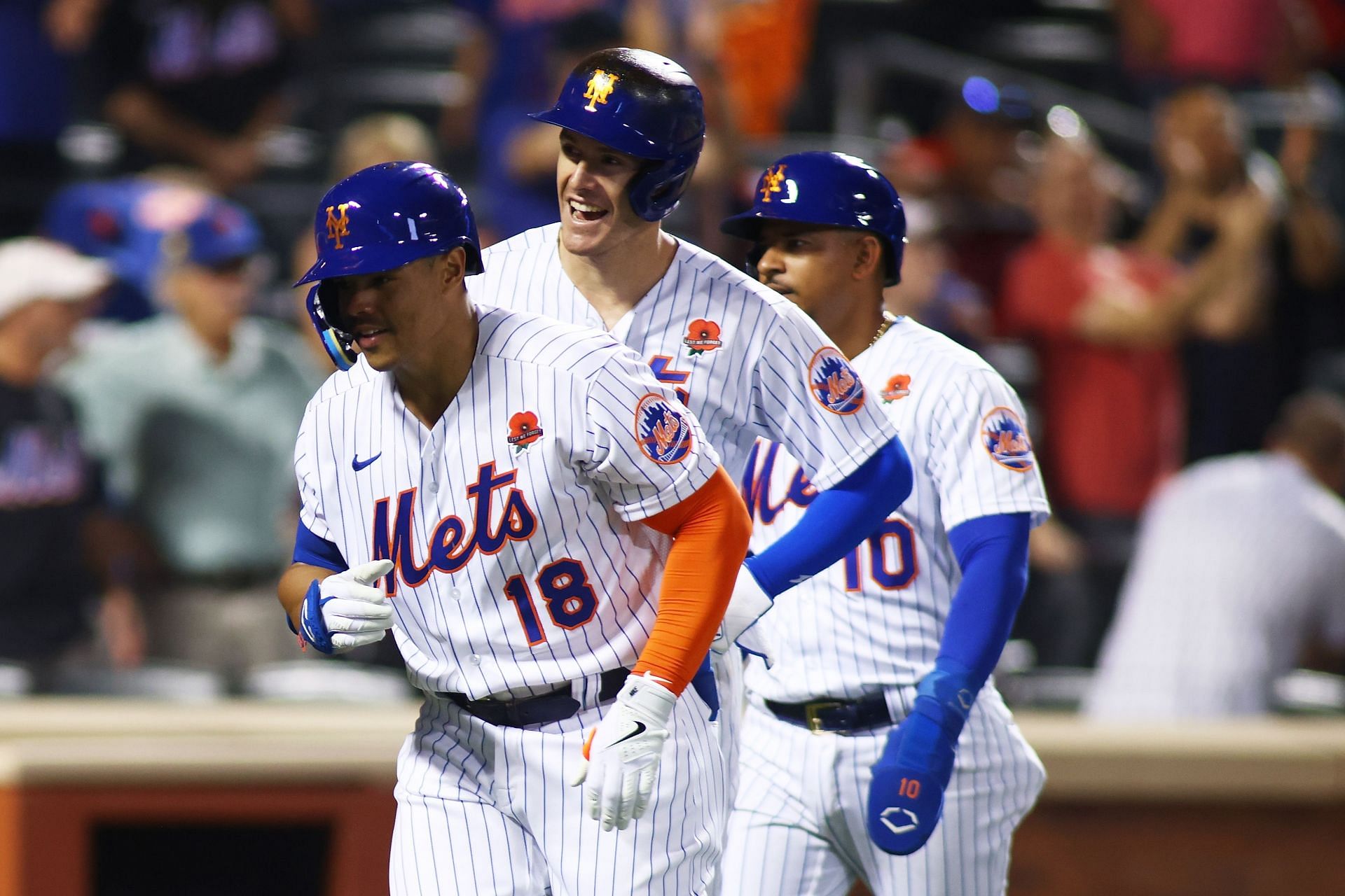 Nick Plummer of the New York Mets celebrates after hitting a three-run homer.
