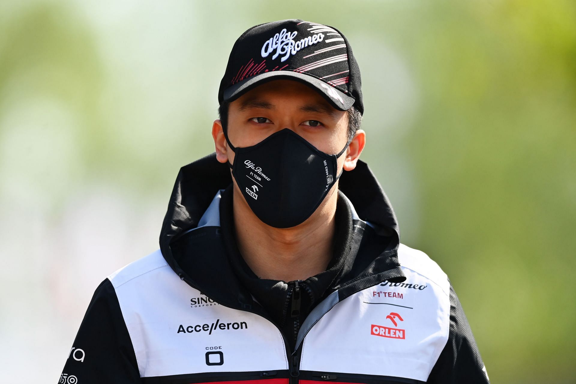 Guanyu Zhou walks in the Paddock prior to practice ahead of the F1 Grand Prix of Emilia Romagna at Autodromo Enzo e Dino Ferrari on April 23, 2022, in Imola, Italy. (Photo by Dan Mullan/Getty Images)