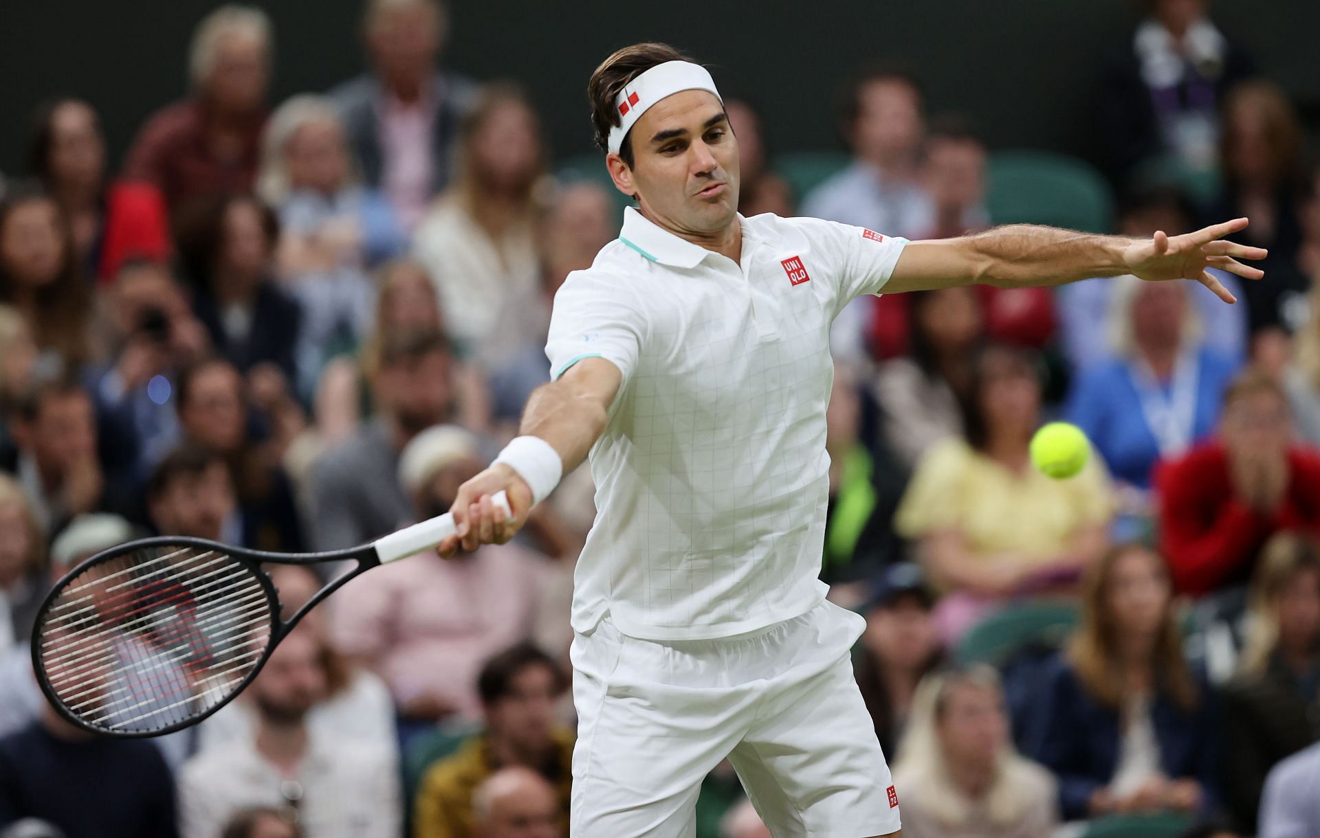 Roger Federer in action at the 2021 Wimbledon - Day Seven