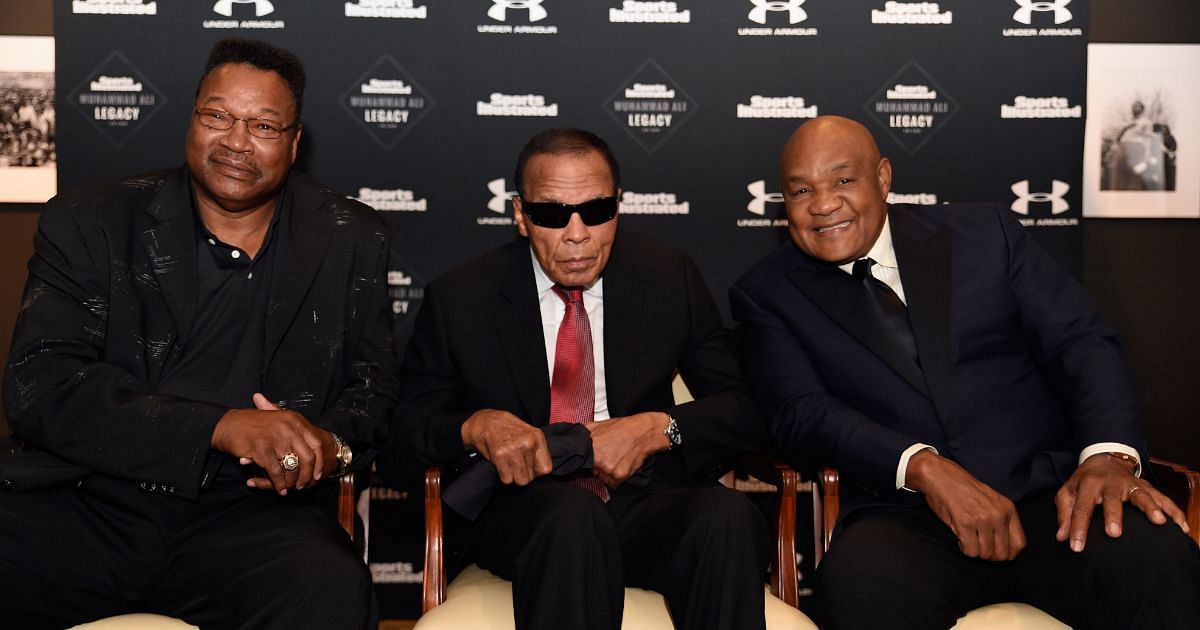Holmes, Ali, and George Foreman in 2015