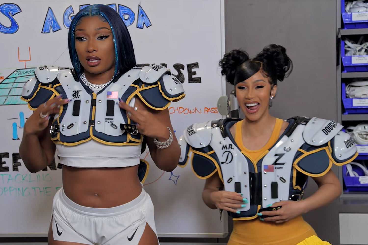 Cardi and Megan suited up to play on the Chargers practice facility. Source: Cardi Tries