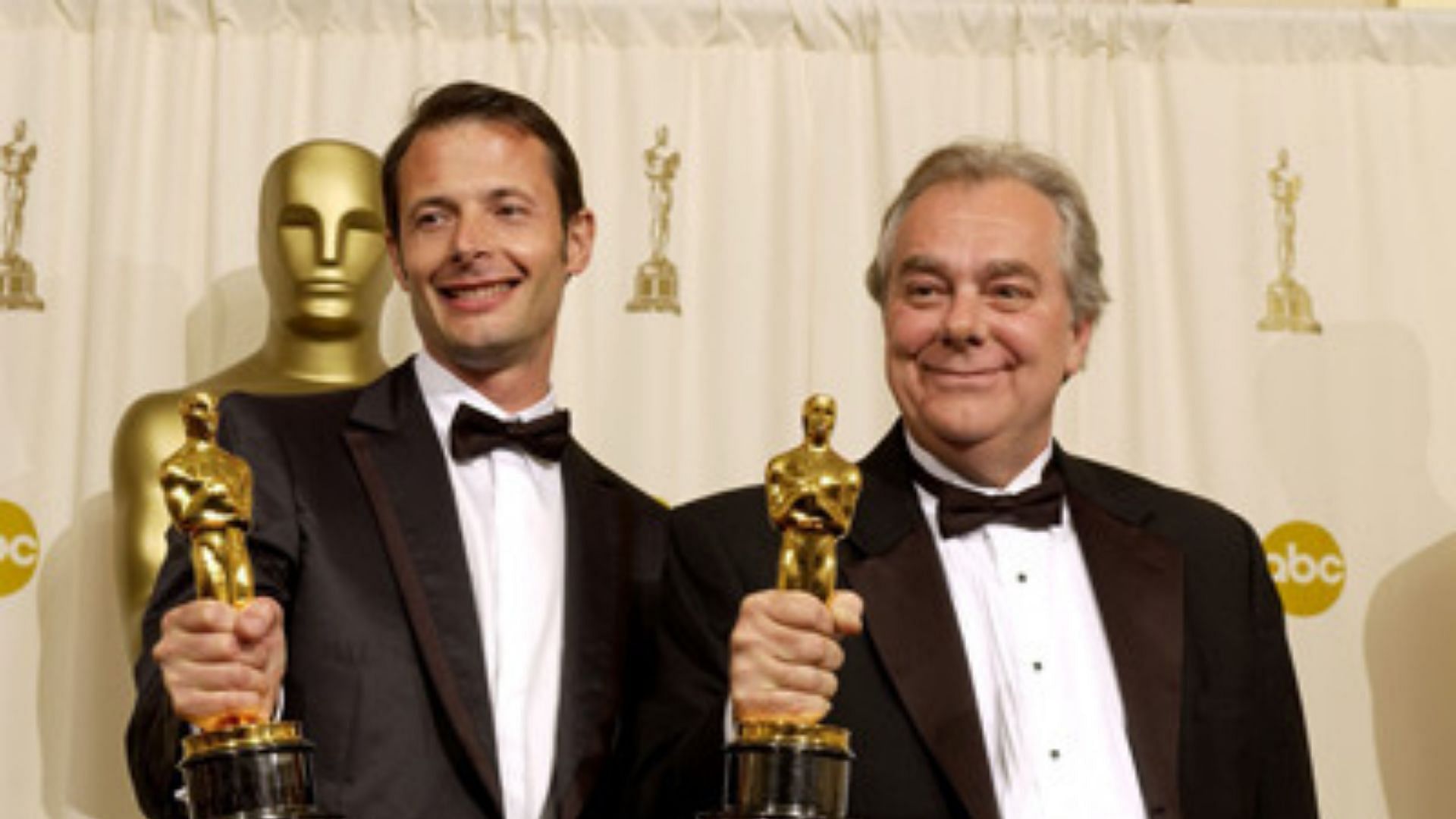 Jean-Xavier de Lestrade and Denis Poncet accepting an award (Image via IMDb)