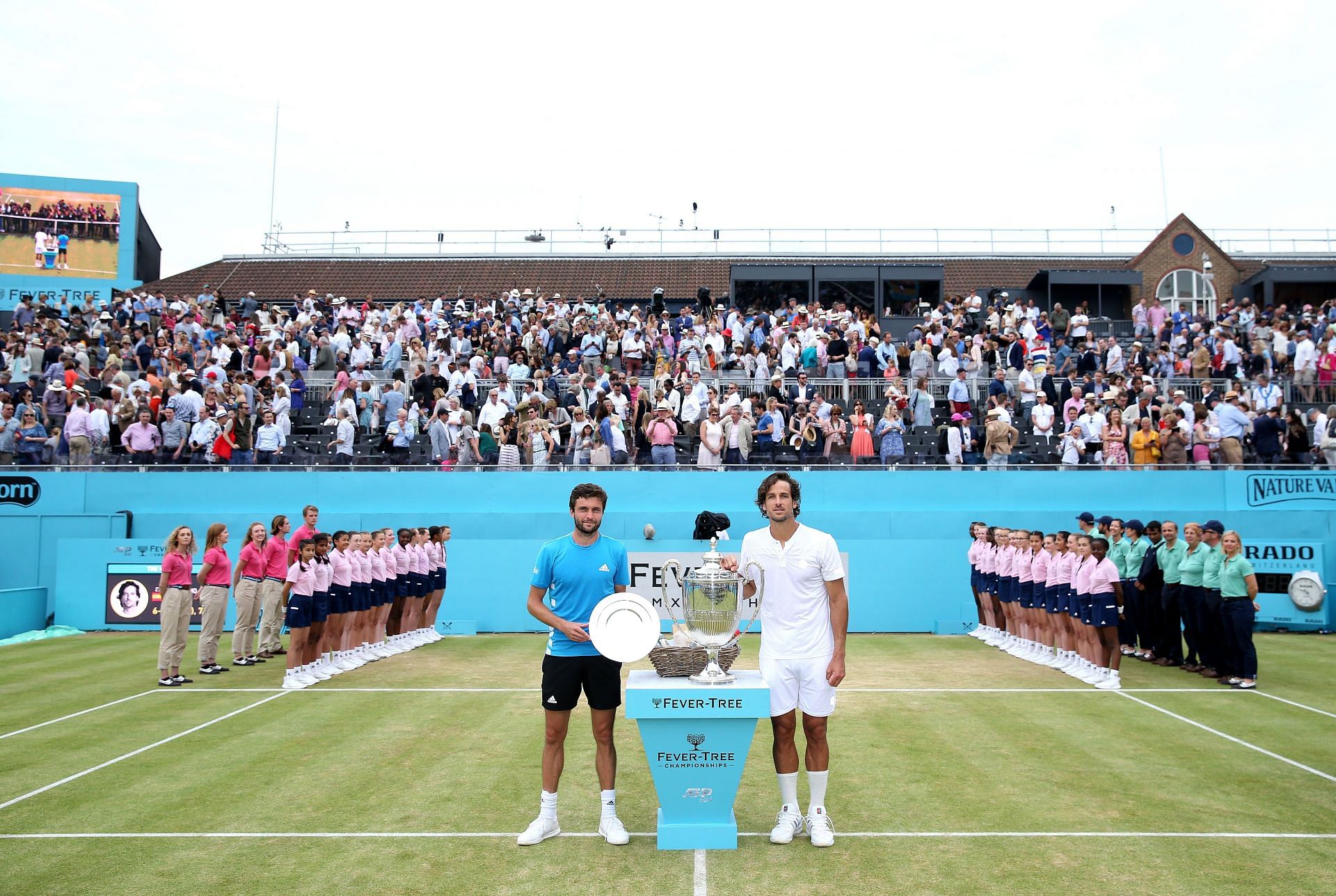 Feliciano Lopez along with runner-up Gilles Simon at the Queens Club in 2019