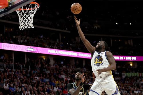 Golden State Warriors vs. Denver Nuggets — Game 4; Draymond Green drives for a lay up.