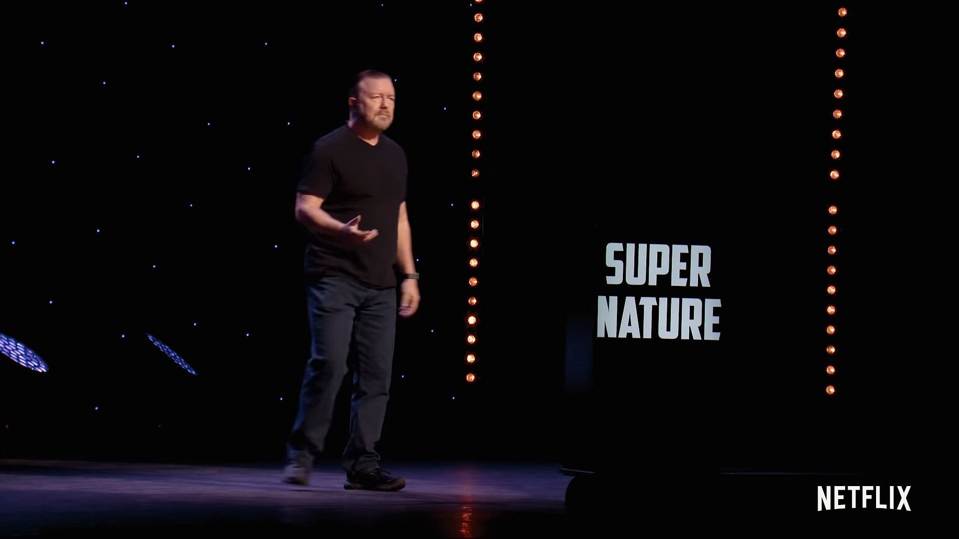 Ricky Gervais in his latest Netflix special (Image via Netflix)
