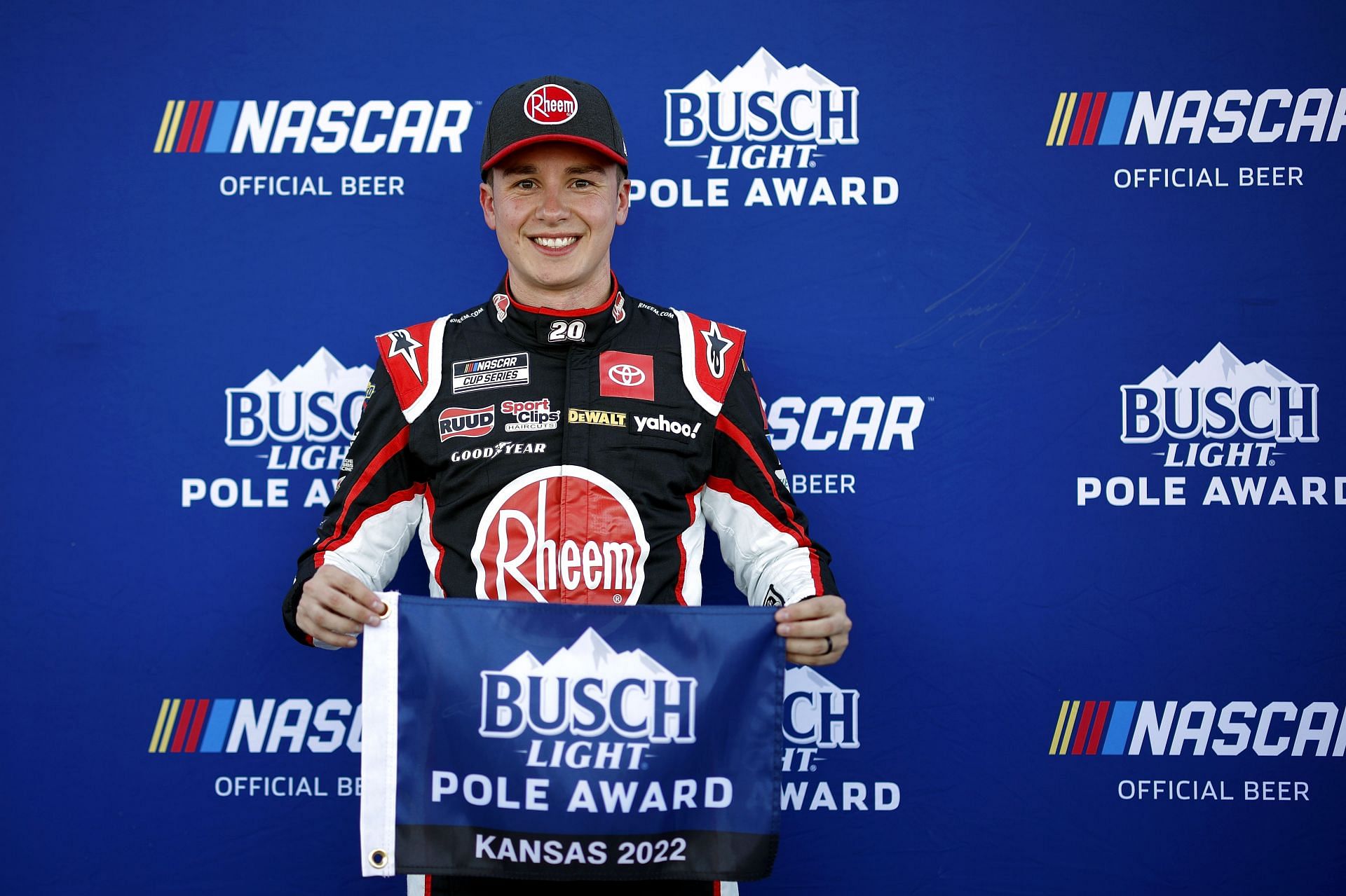 Christopher Bell poses for photos after winning the pole award for the NASCAR Cup Series AdventHealth 400 at Kansas Speedway (Photo by Chris Graythen/Getty Images)