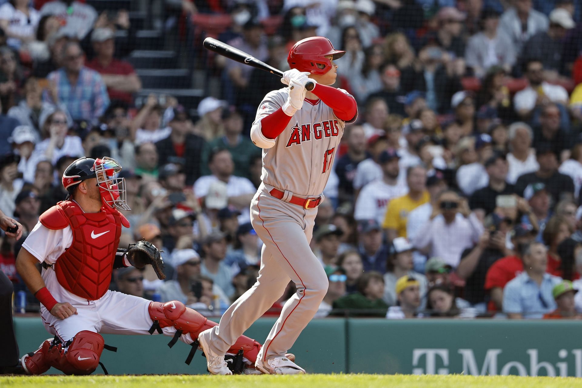 Shohei Ohtani follows through on his RBI single against the Boston Red Sox.