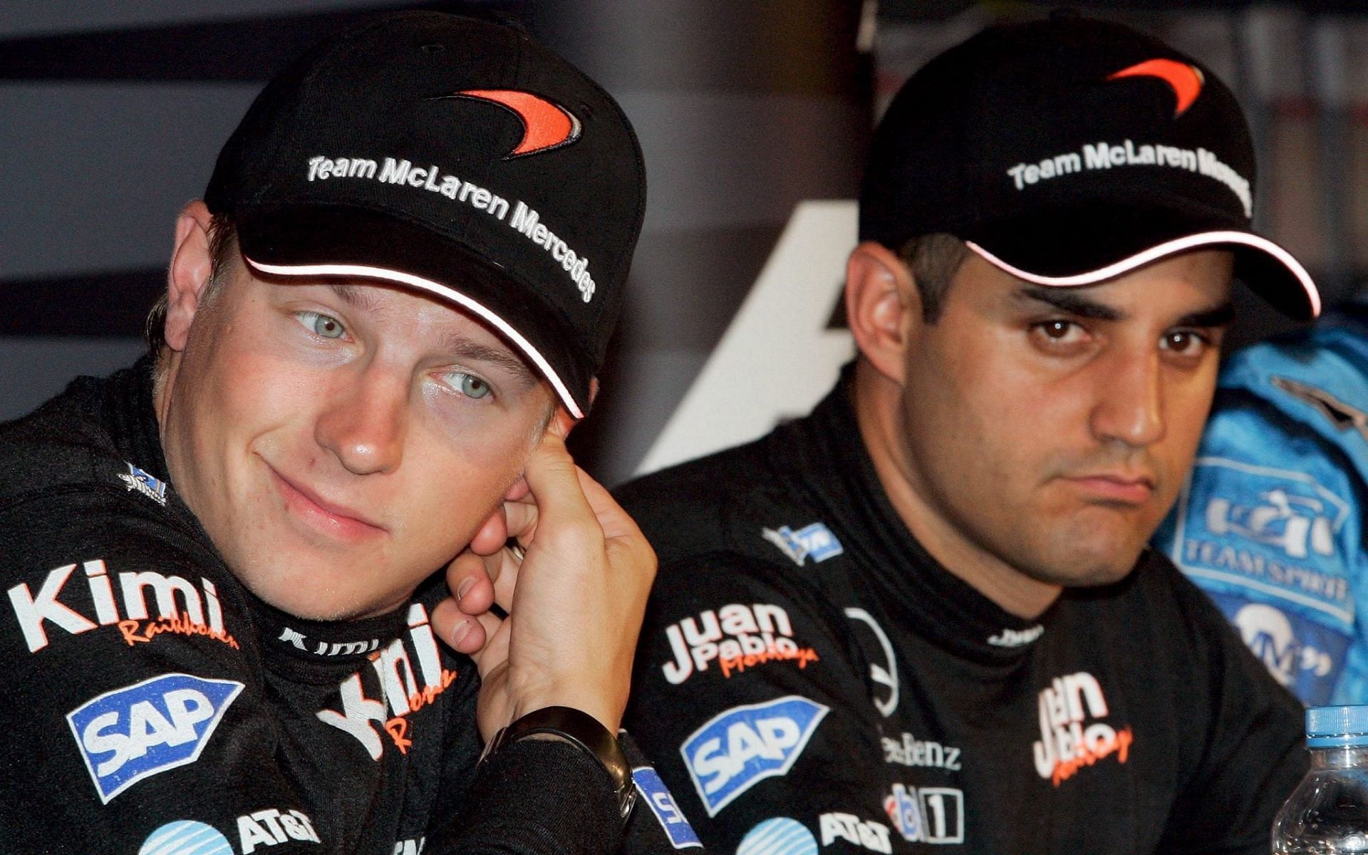 Kimi Raikkonen (left) and Juan Pablo Montoya (right)