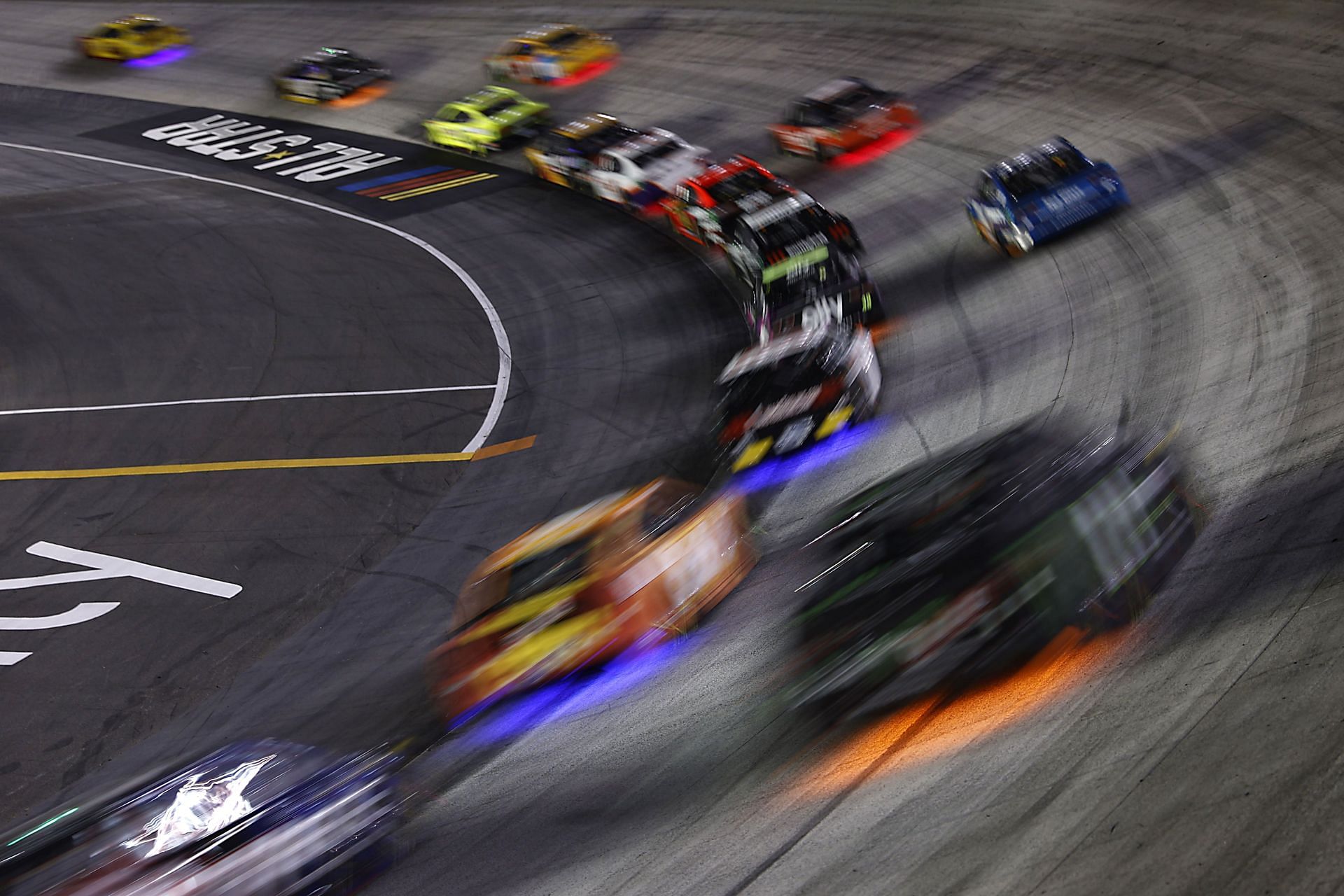 Cars race during the NASCAR Cup Series All-Star Race at Bristol Motor Speedway. (Photo by Patrick Smith/Getty Images)