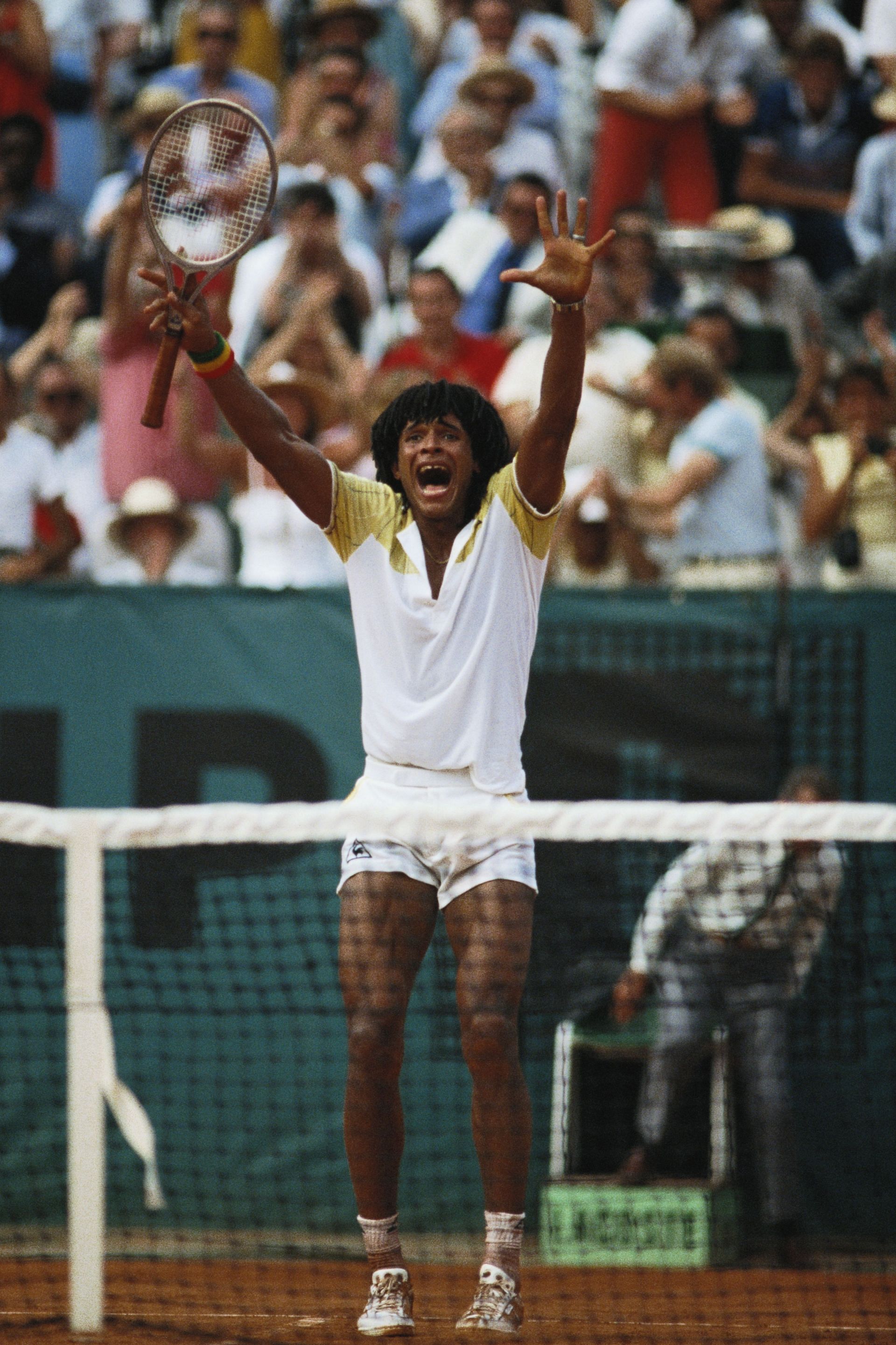 Yannick Noah celebrates after winning at Roland Garros in 1983