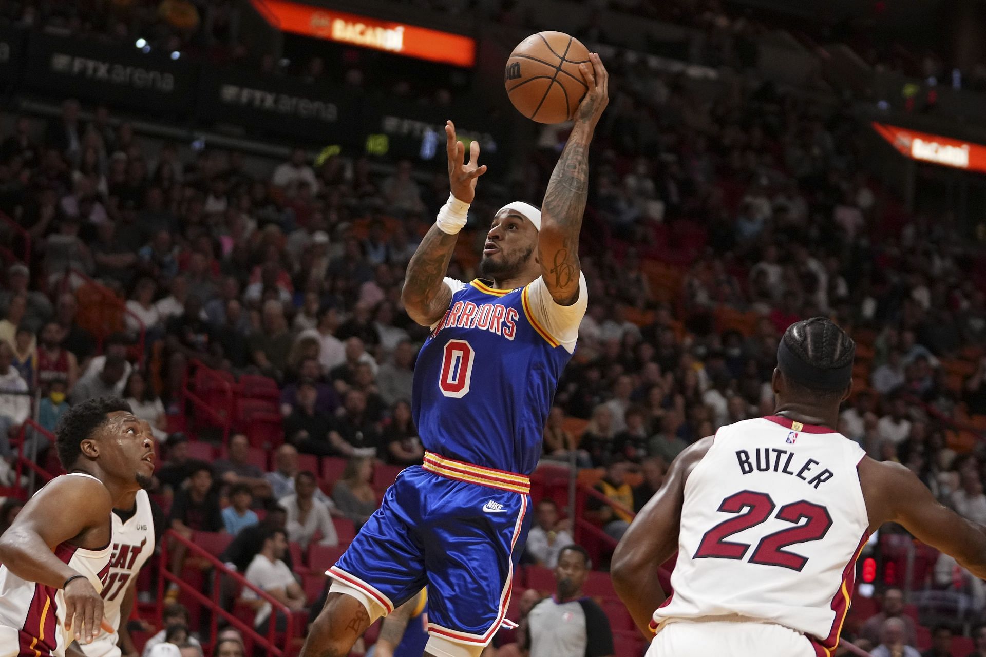 Gary Payton II attempts to score off a layup