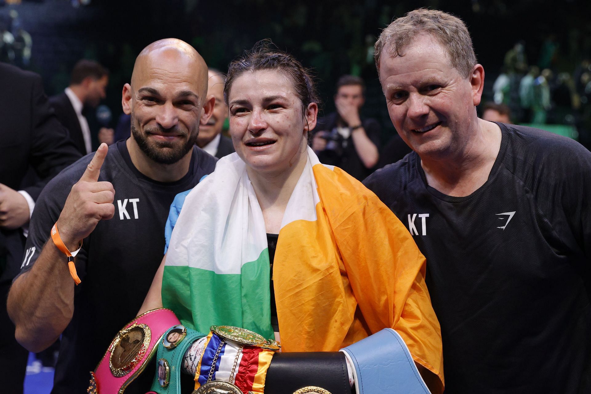 Katie Taylor (center) remains hopeful that she can fight in Ireland before her career is done.