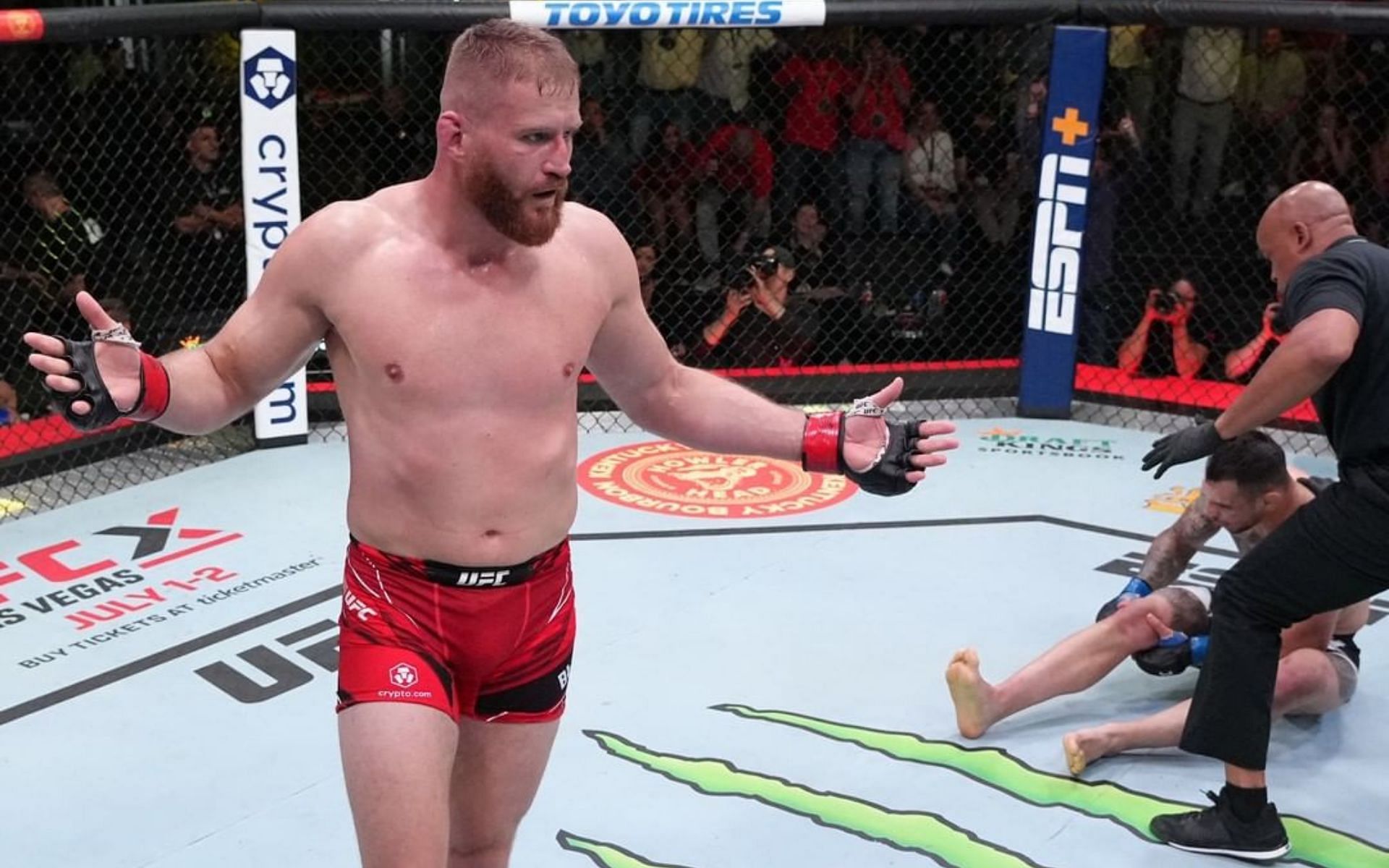 Jan Blachowicz defeats Aleksandar Rakic, who went down due to injury [Photo via @ufc on Instagram]