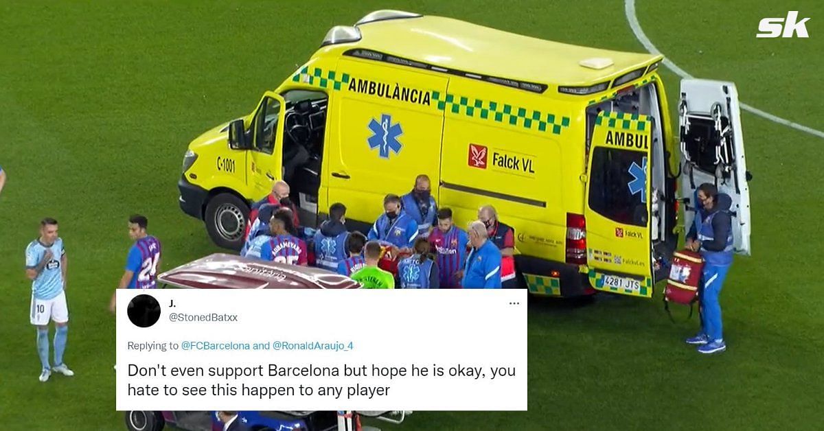 Barcelona fans pray for defender following sickening head collision