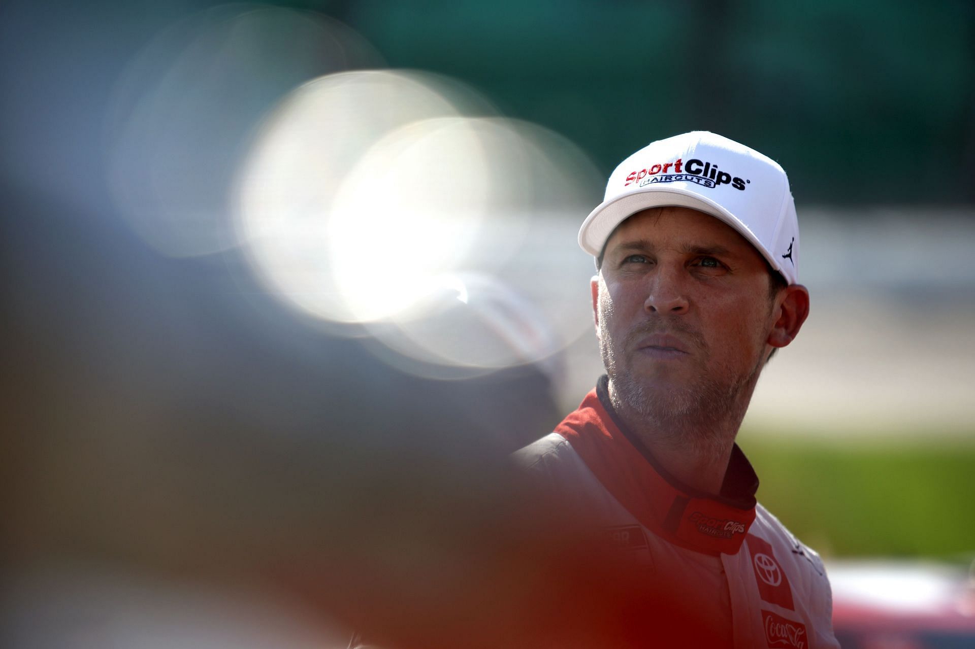 Denny Hamlin looks on during practice for the 2022 NASCAR Cup Series AdventHealth 400 at Kansas Speedway in Kansas City, Kansas (Photo by Sean Gardner/Getty Images)