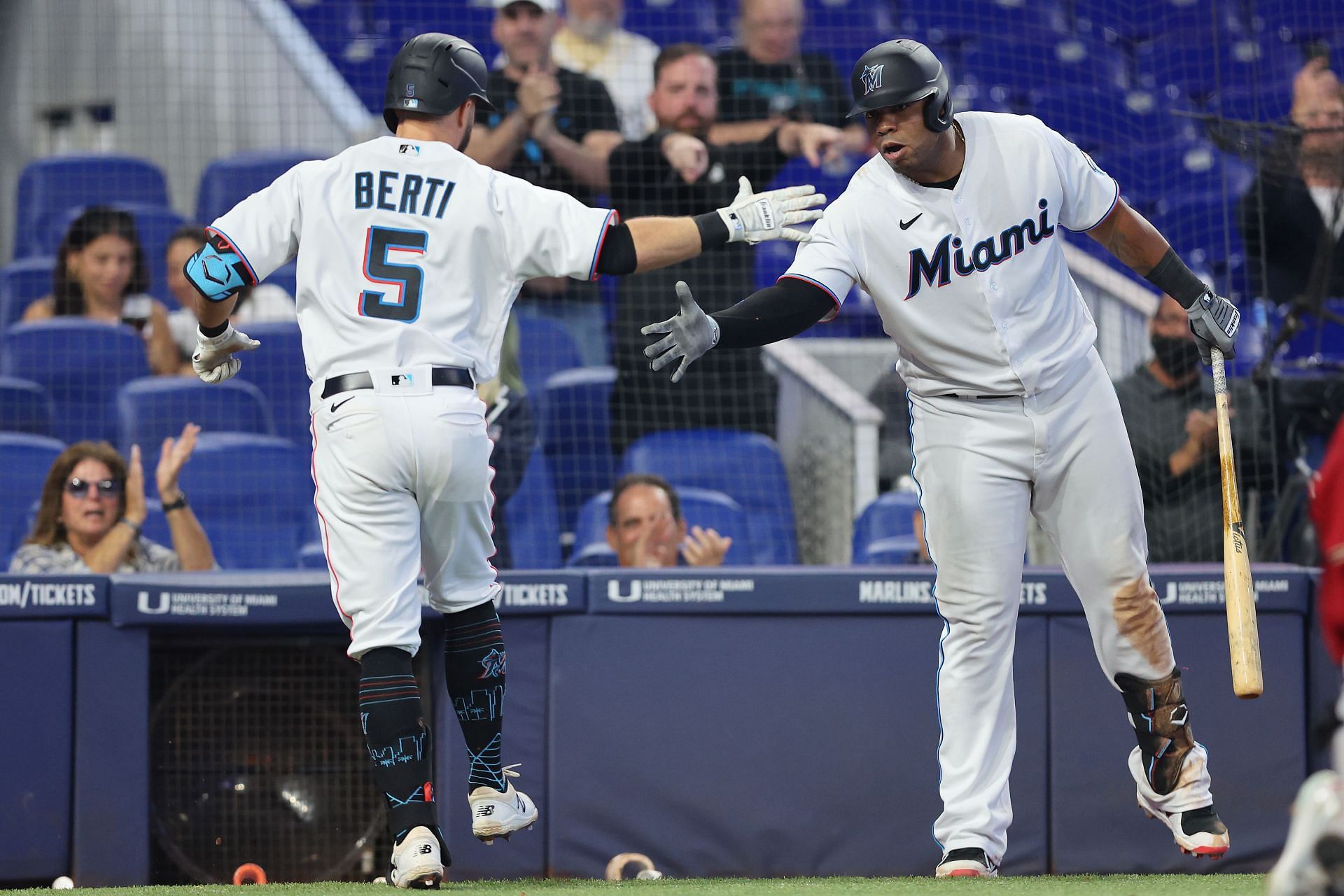 Berti celenrates a home run with his Miami Marlins teammate.
