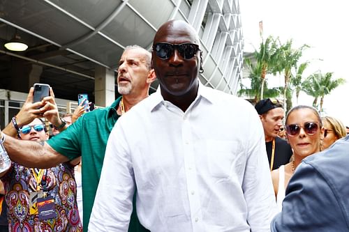 Basketball legend Michael Jordan walks in the paddock prior to the F1 Grand Prix of Miami